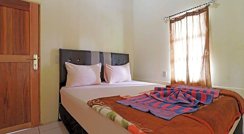 Tuk Tuk Timbul Bungalows