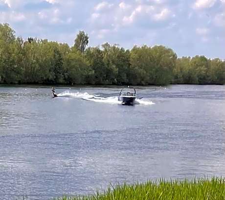 Award winning Serenity Lodge with outstanding lakeside views from the hot tub , at Tallington Lakes Leisure Park, Stamford