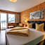 Wohlfühlhotel Hubertushof am Arlberg - Ski-In & Ski-Out - Sky Pool