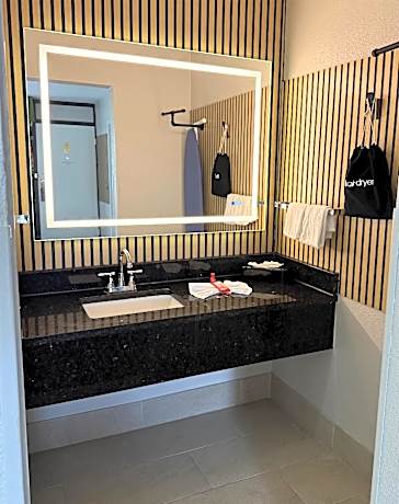 Two-Room Suite with Two Double Beds, Spa Bath, Separate Living Area and Sofa - Non-Smoking