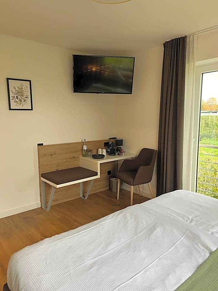 Vorgebirgsblick Ruhige Gästezimmer mit Self-Check-in