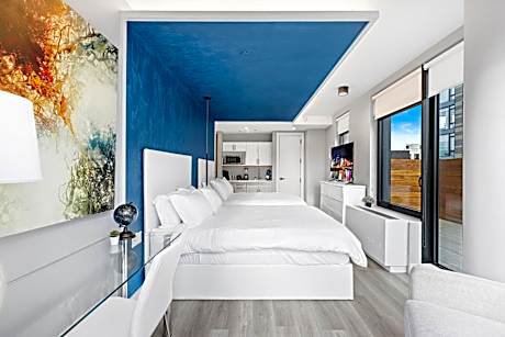 Deluxe Queen Suite with Two Queen Beds, Balcony, Non-Smoking