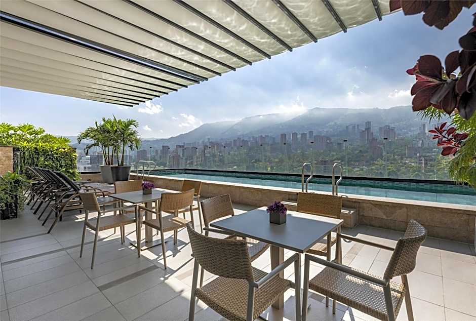 York Medellin, Curio Collection by Hilton