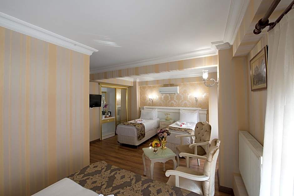 Photo 1 of 13 of Quadruple Room