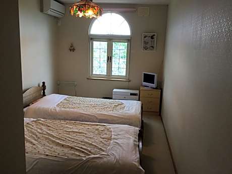 Twin Room with Shared Bathroom - Non-Smoking