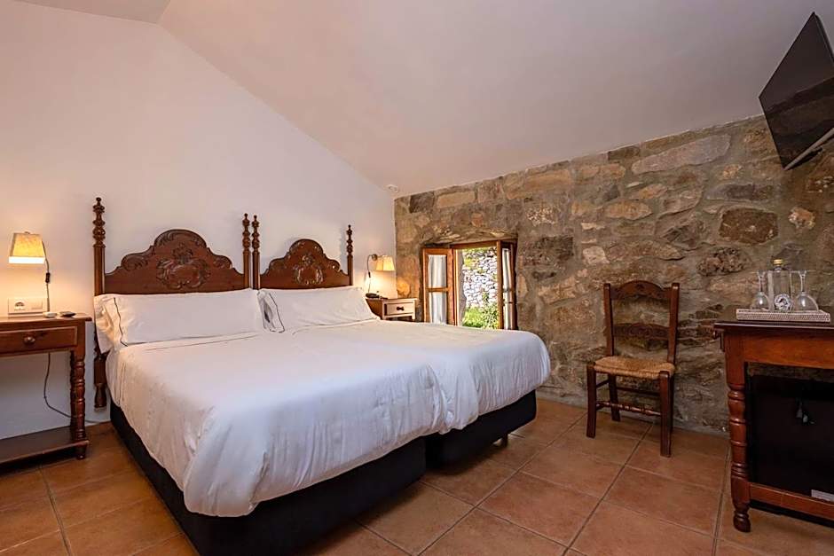 Tugasa Hotel y Apartamentos rurales La Posada