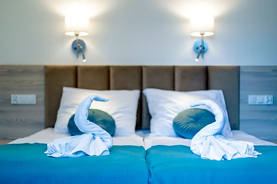 APARTAMENTY przy plaży z basenem z podgrzewaną wodą i mini SPA - Ośrodek Kolonijno-Wczasowy Mewa