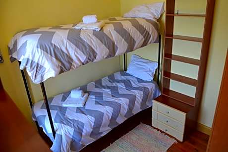 Single Bed in Dormitory Room