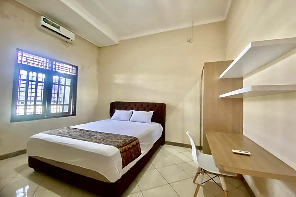 OYO 93838 Delia Inn Syariah