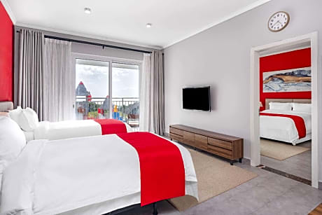 Queen And Twin Bed - Junior Suite With Partial Ocean View