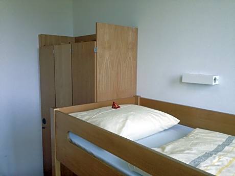 Single Bed in Female Dormitory Room