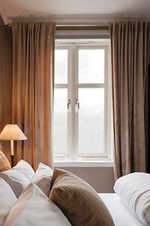 Fjærland Fjordstove Hotell - Huseby Hotelldrift AS