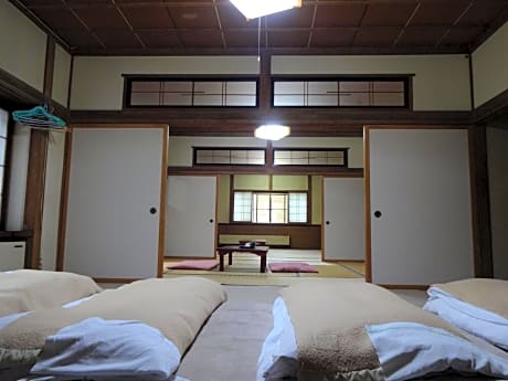 Japanese-Style Large Family Room with Shared Bathroom