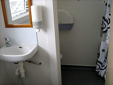 Single Bed in Dormitory Room