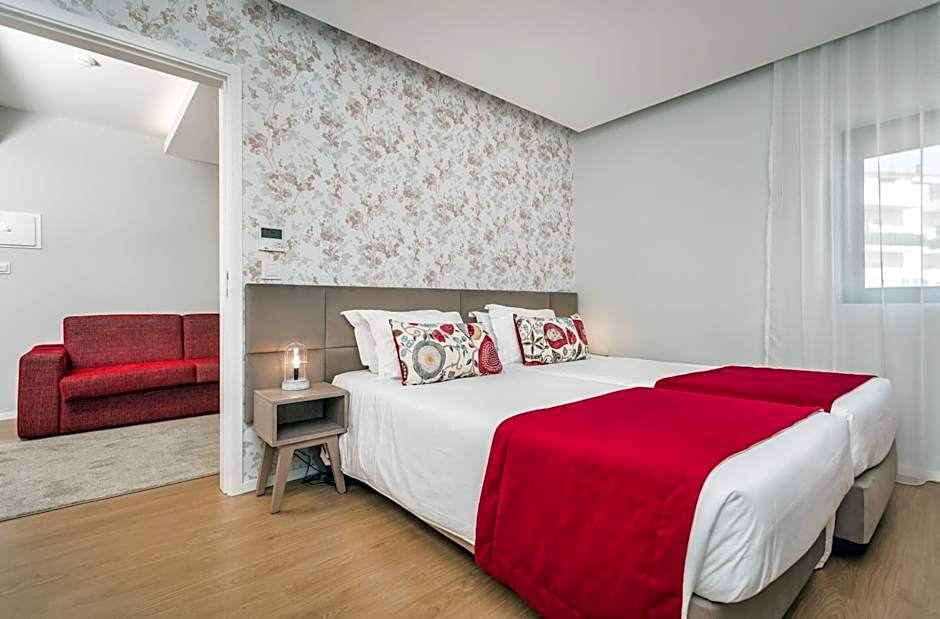 Essence Inn Marianos Hotel
