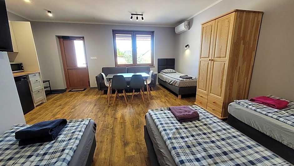 Wrzosowe Wzgórze 5 - Studia i Apartamenty