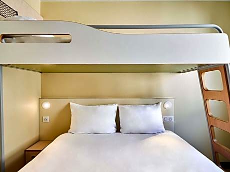 Room with One Queen Bed and One Bunk Bed