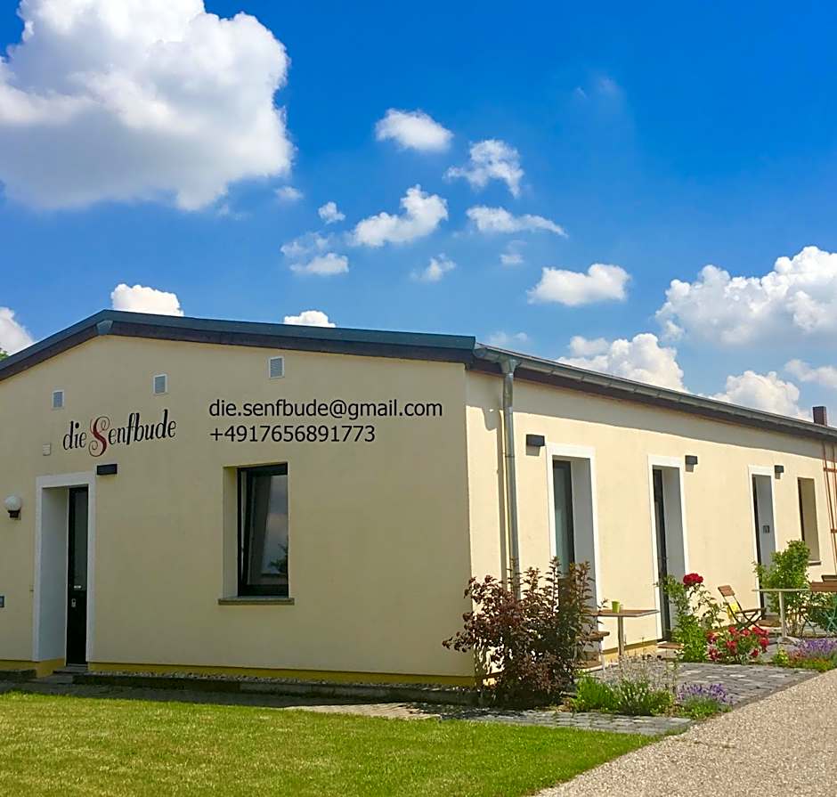 die Senfbude - wunderschöne Apartments für 4 Personen mit Terrasse & Stellplatz