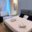 Sun Art Naples Rooms