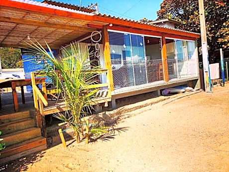 Casa charmosa pé na areia por do sol