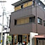 Guesthouse Hyakumanben Cross