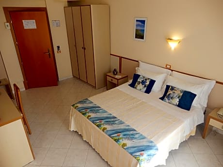 Standard Triple Room with Balcony