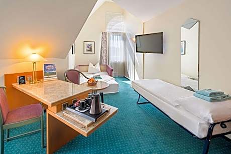 Comfort Quadruple Room with Queen Bed and Sofa Bed