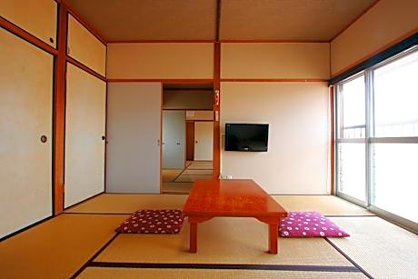 Japanese-Style Family Room with Shared Bathroom