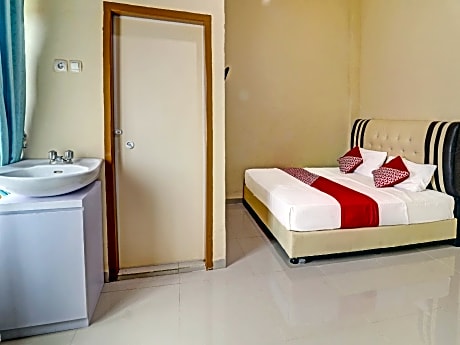 OYO 90945 Arizon Kost