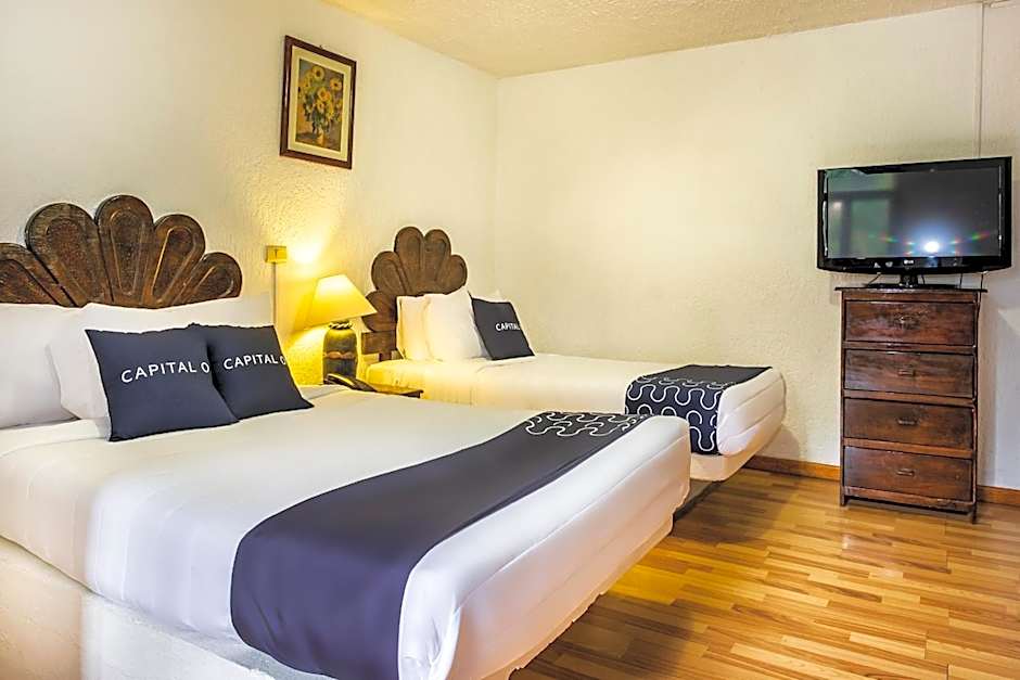 Capital O Hotel Central