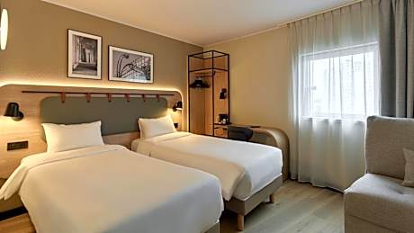 Standard Double Room with Two Single Beds and Sofa Bed