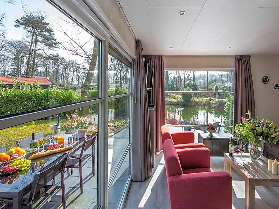 Modern chalet with two terraces and near a pond