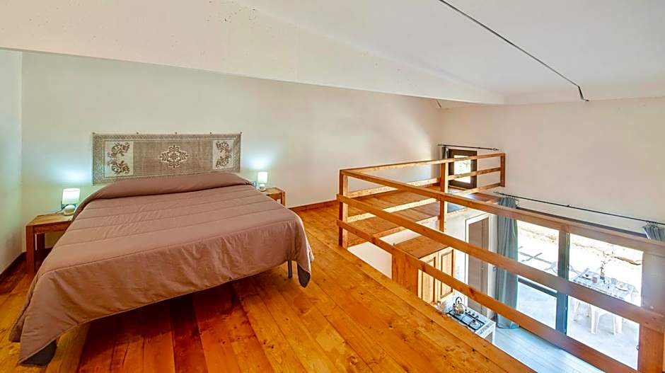 Lofts with private outdoor area and swimming-pool in Badesi