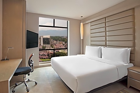 Loft Breezy Suite - King Room with 15% off on Food and Soft Beverage and Free Two-Way Airport Transfer in Private Car