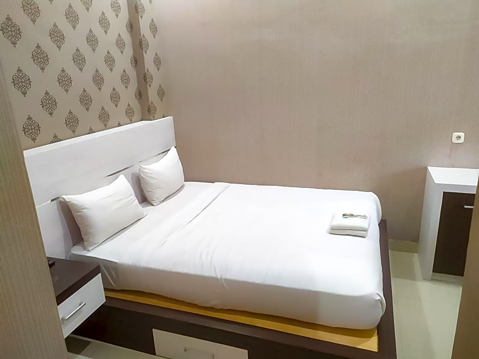 RedDoorz Syariah near Sultan Syarif Kasim II Airport