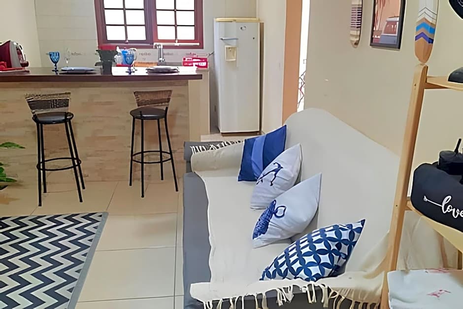 Studio pé na areia com área de churrasco privativa