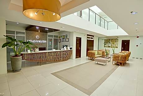 Holiday Suites Business District - Formerly Empire Suites Hotel