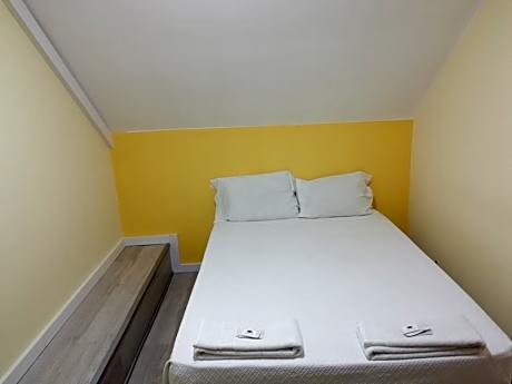 Quadruple Room with Private Bathroom