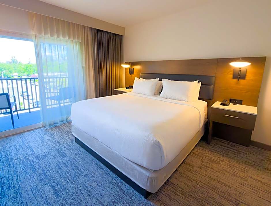 Photo 1 of 7 of 1 King Bed with Sofabed Suite, Hearing/Mobility Accessible, Roll in Shower, Balcony