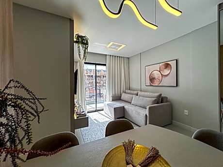 133 - Lindo apartamento na praia de Bombas