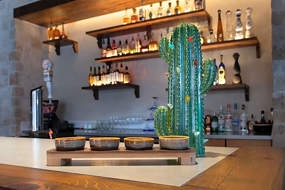 Texican Court, by Valencia Hotel Group