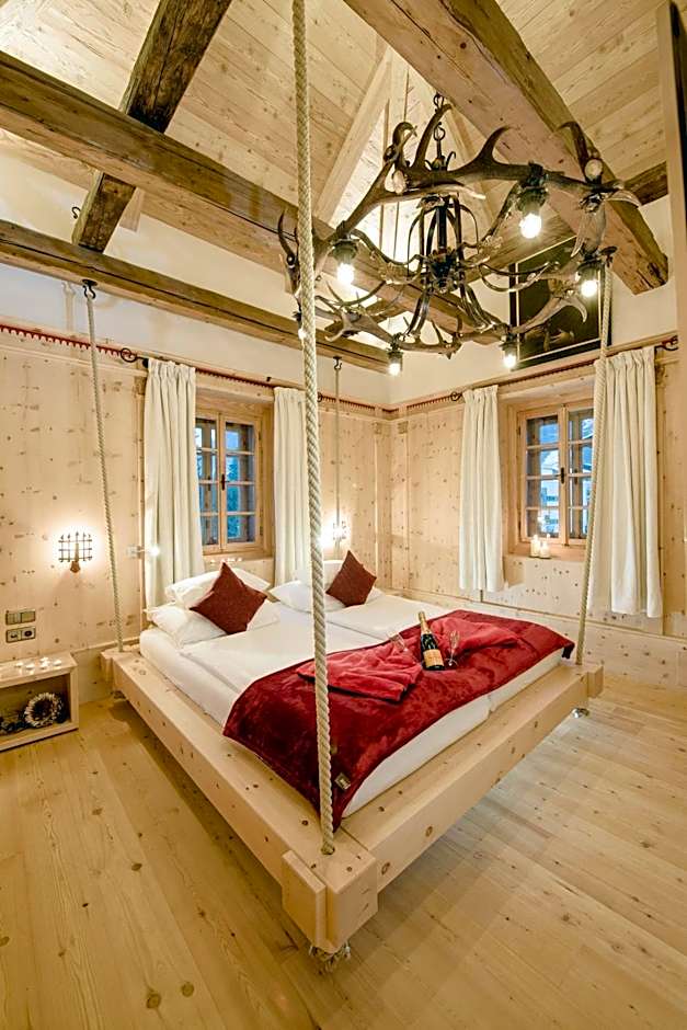 Hotel Norica - Thermenhotels Gastein mit dem Bademantel direkt in die Therme