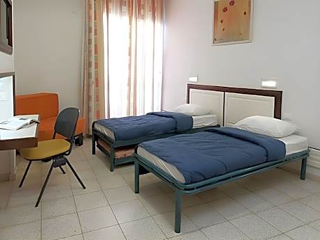 Single Bed in Male Dormitory Room