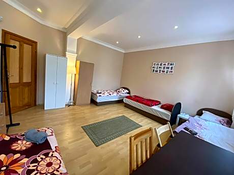 Quadruple Room with Shared Bathroom