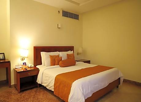Superior Room 1 King Bed Complimentary tea/coffee service for all our in-house guest at the poolside with some popular evening snacks of Siliguri from 5pm to 7pm