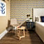115 The Strand Hotel by NEU Collective