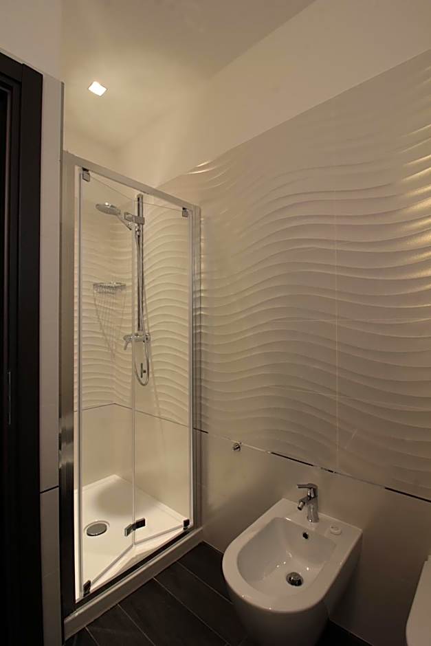 Foto 1 di 11 di Triple Room with Private Bathroom