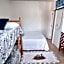 KITNET S2 em TORRES-RS - Na mais bela praia Gaúcha - Cozinha - Banheiro - Ar condicionado - TV smart 32' - Wi-Fi - Estacionamento - Anfitriã Superhost no BnB