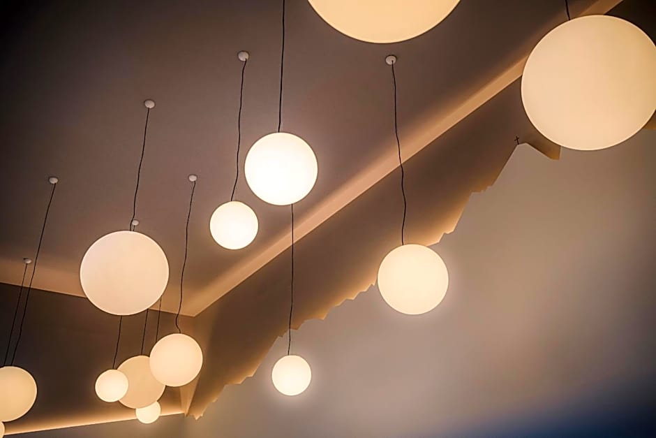 Hotel Norica - Thermenhotels Gastein mit dem Bademantel direkt in die Therme