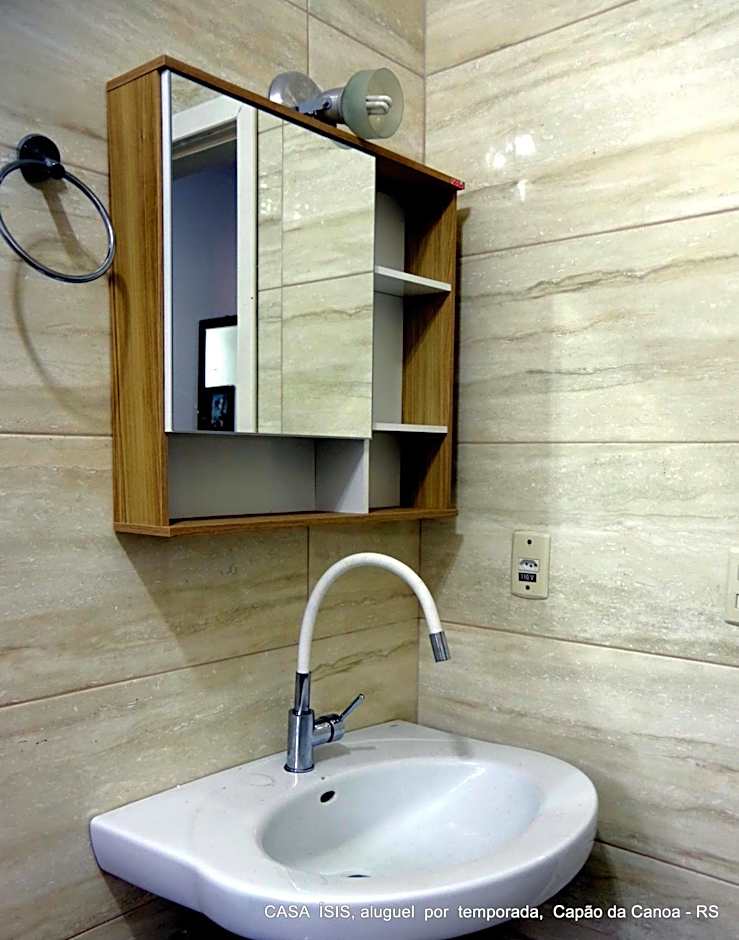 Casa ÍSIS de aluguel por temporada em Capão da Canoa com piscina